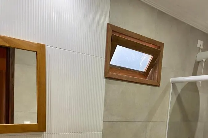Banheiro em Pousada Corais do Bitingui
