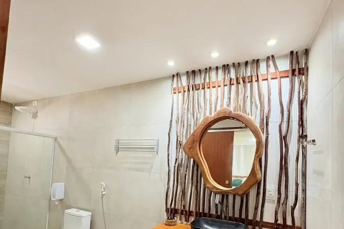 Banheiro em Pousada Corais do Bitingui