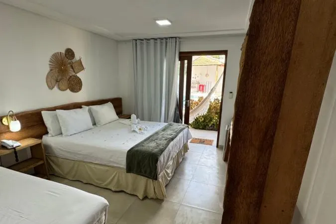 Quarto em Pousada Corais do Bitingui