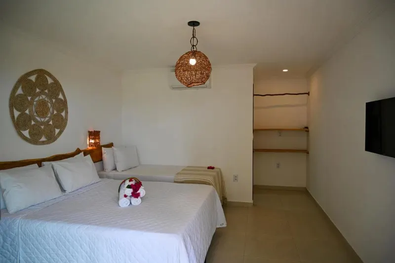Quarto em Pousada Estação do Mar